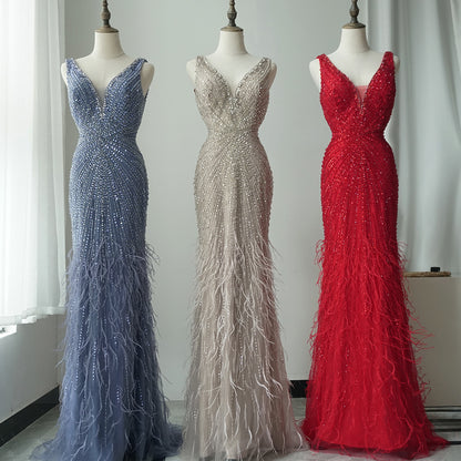 2025 Blue Spaghetti Strap Luxury Dubai Evening Gowns with Feathers and Beading for Women Wedding Party
