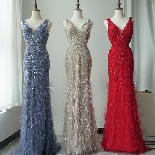 2025 Blue Spaghetti Strap Luxury Dubai Evening Gowns with Feathers and Beading for Women Wedding Party